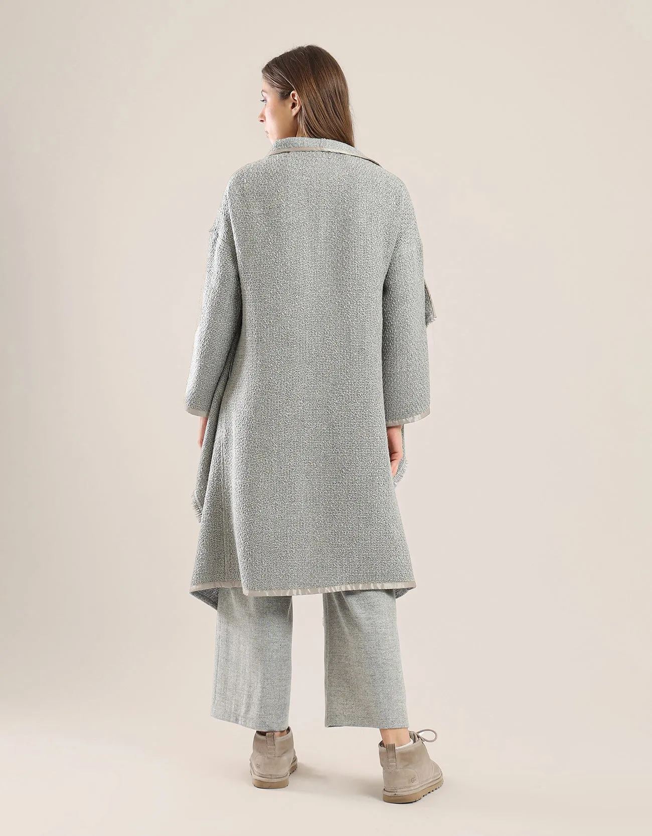 Coat with draped collar